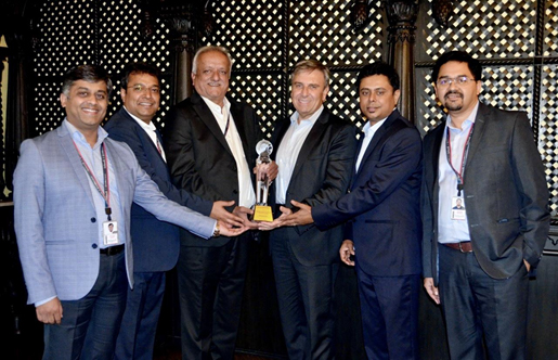 Mohammed M. Ajouz (center) presents the ACE Alliance Award to the Birlasoft team